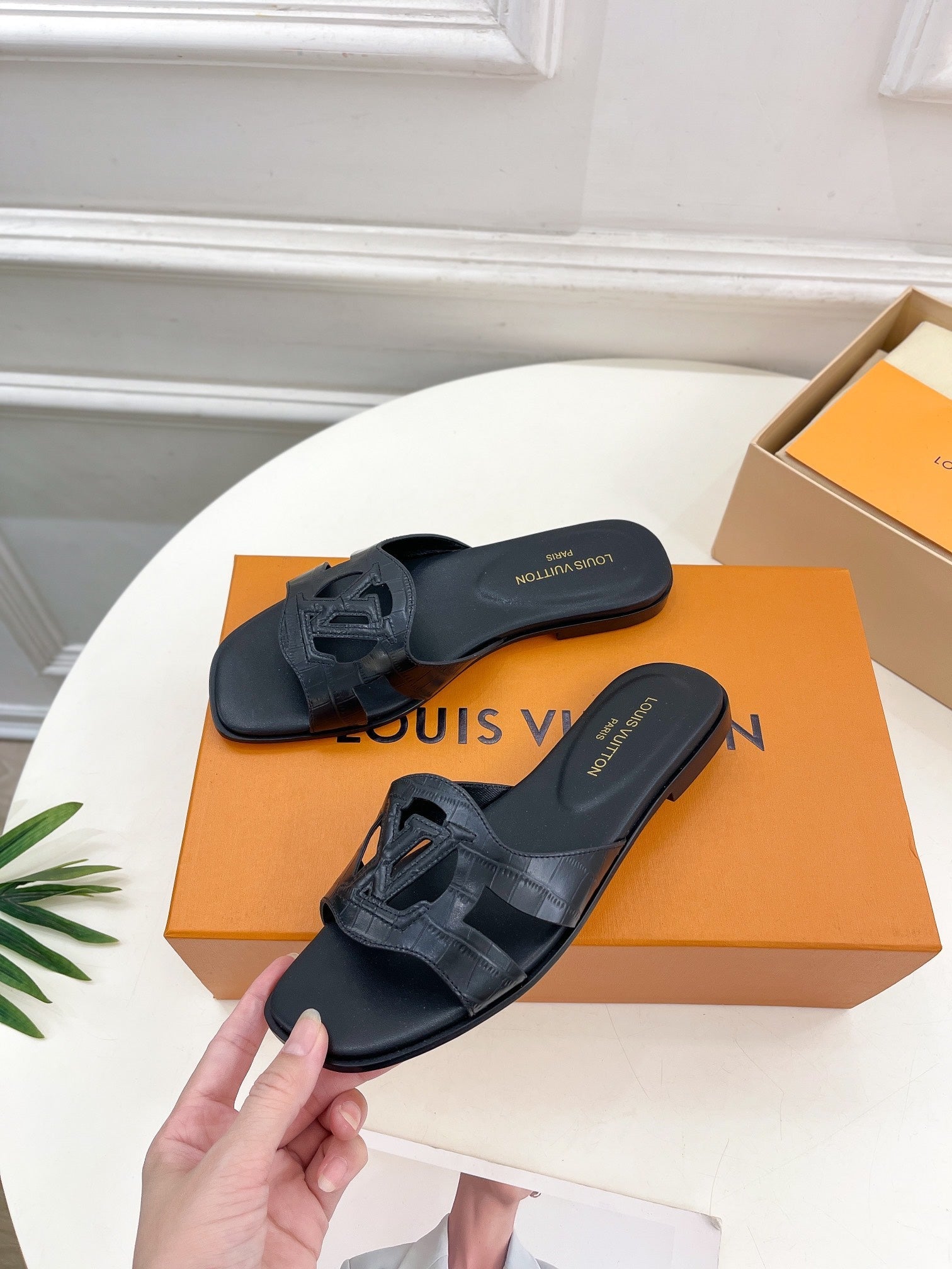 isola flat mule black calfskin