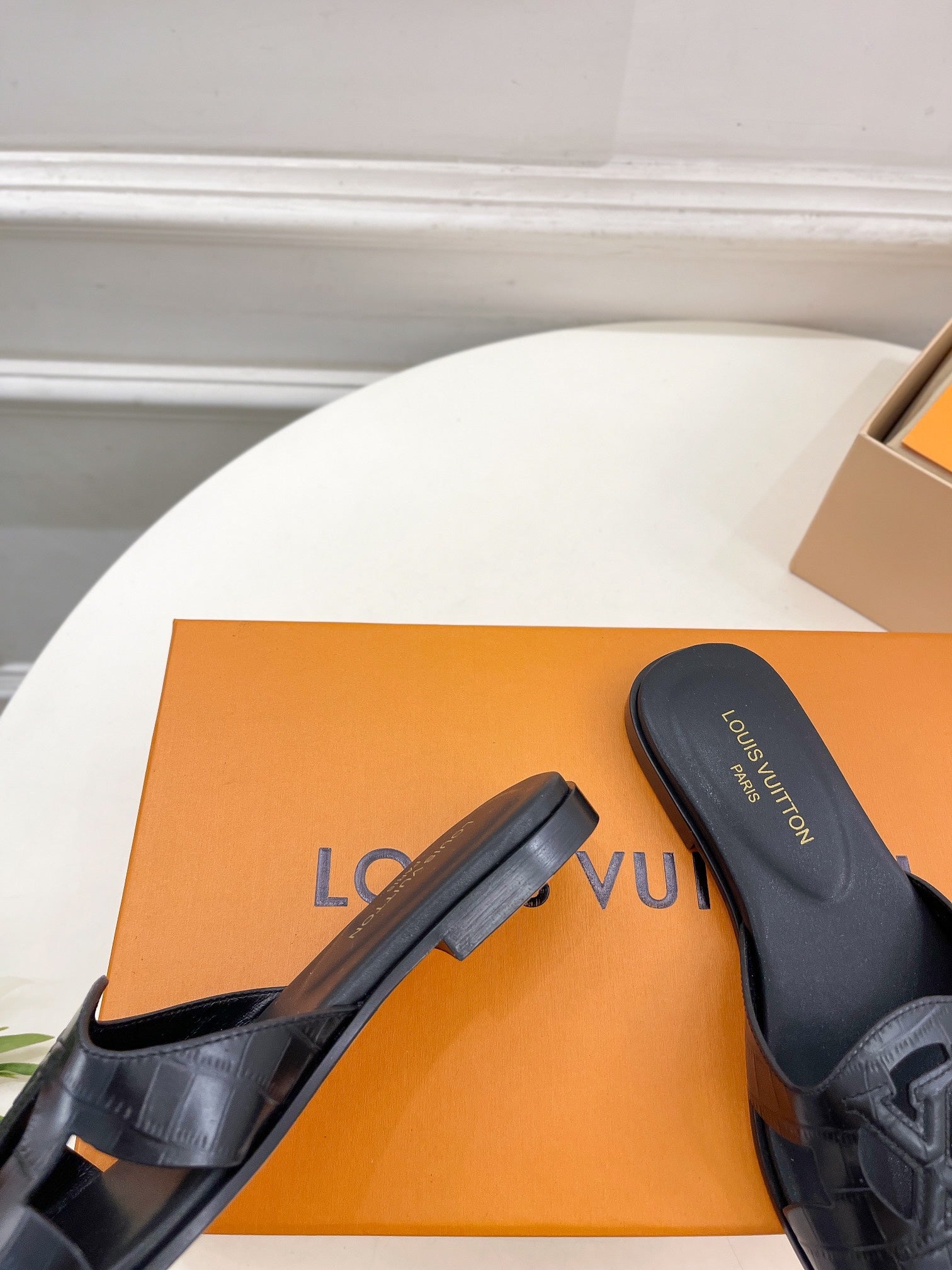 isola flat mule black calfskin