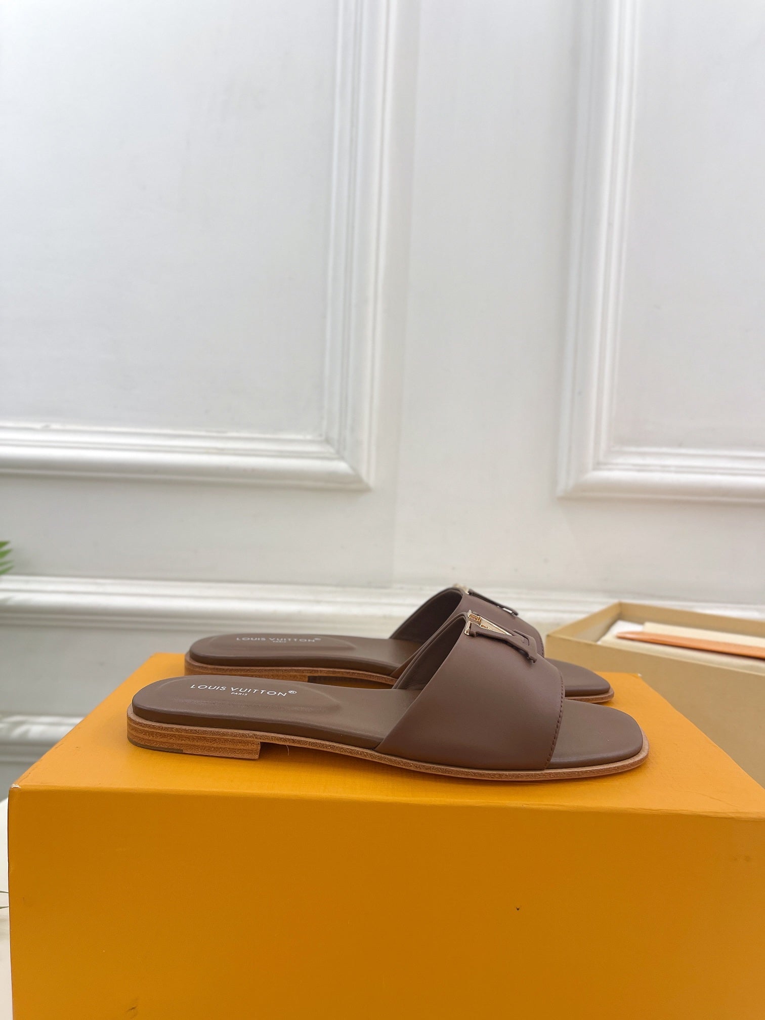 lv capri flat mule chocolate calfskin