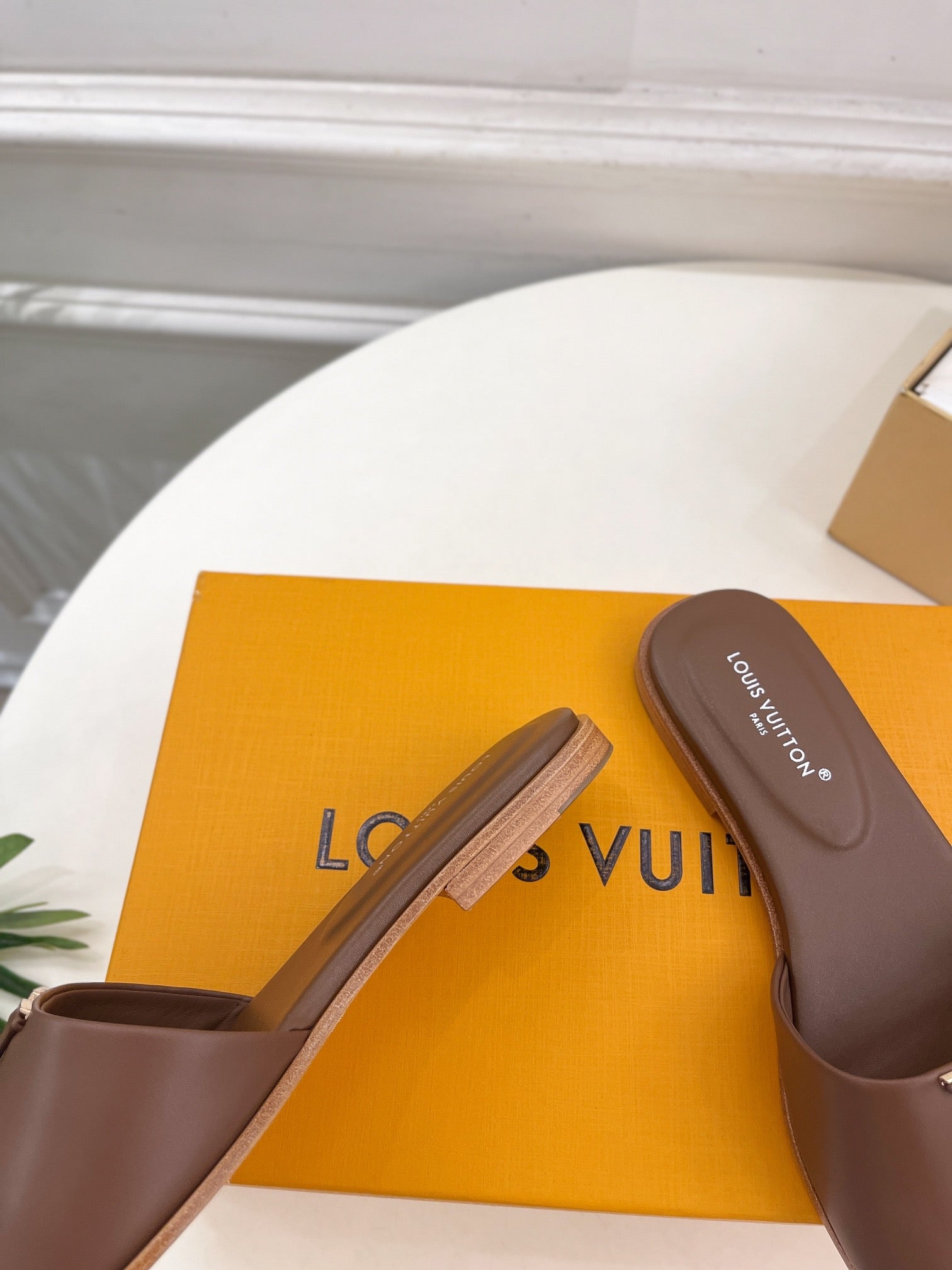 lv capri flat mule chocolate calfskin